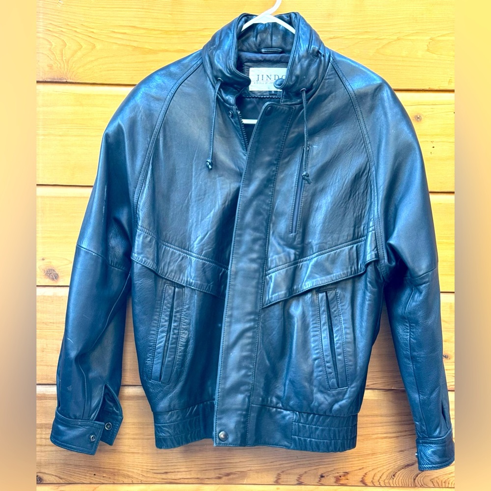 JINDO Buttery-soft black leather bomber jacket with lots of detail and pockets.